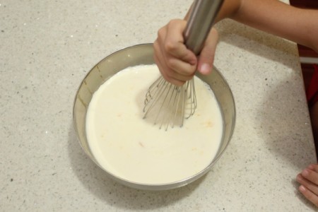 Wet ingredients for butterscotch putting being mixed together.