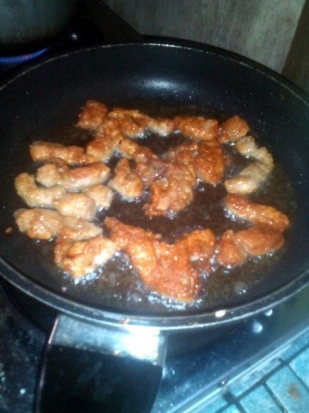 Frying breaded pork