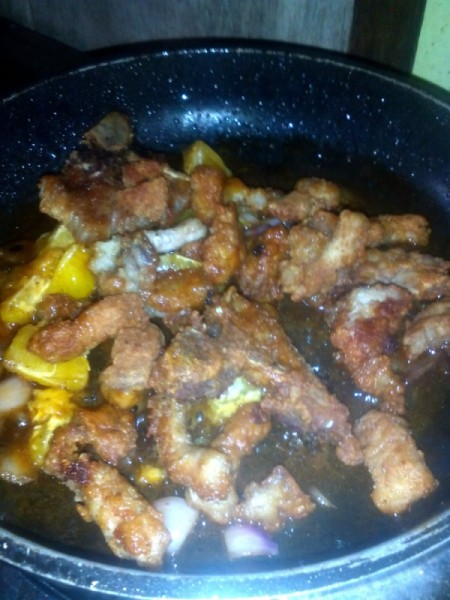 cooked pork added to pan