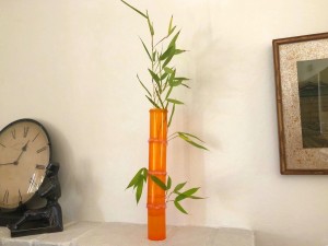 Medicine Bottle Bamboo Vase - vase with a bamboo stalk and several stalks taped to the back