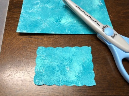 Upcycled Cardboard Box to Gift Basket - card cut out using fancy edge scissors