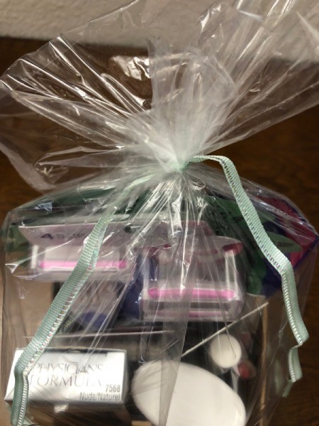 Upcycled Cardboard Box to Gift Basket - place the gift box in the bag and tie with a box