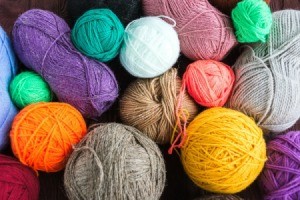 Balls of yarn in different colors and sizes.