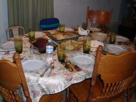 A Thanksgiving table set and ready for dinner.