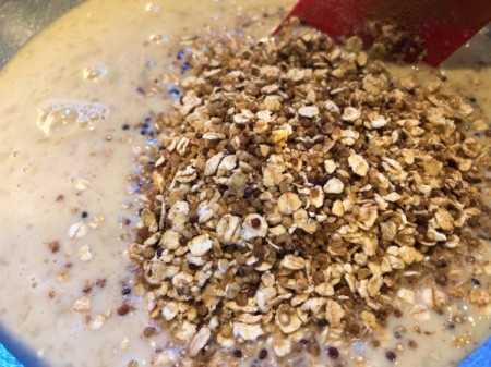 adding dry ingredients to wet