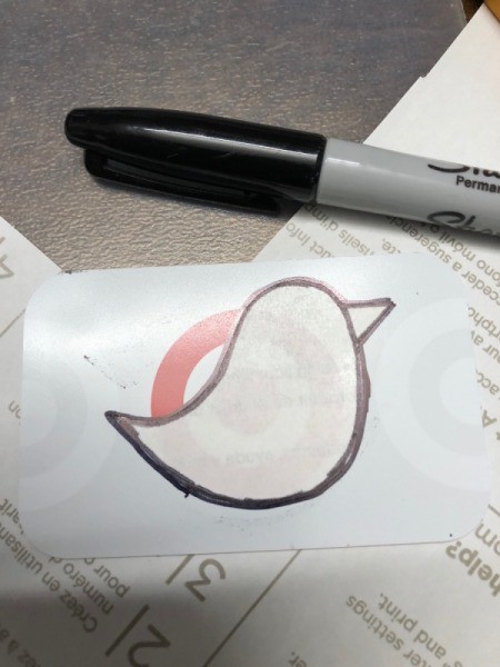 Upcycle Giftcard to Keychain with a Fob - cut out pattern positioned on a Target gift card