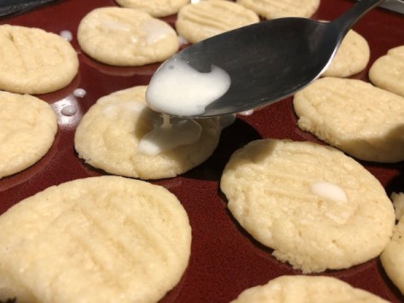 drizzling icing on Cookies