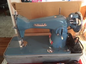 Value of a Vintage White Sewing Machine - portable sewing machine in case