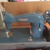 Value of a Vintage White Sewing Machine - portable sewing machine in case