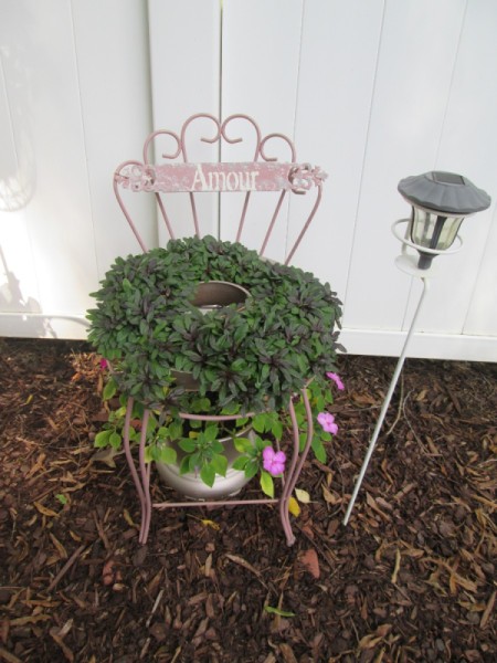 I Love Chairs As Planters In My Garden - another round chair planter