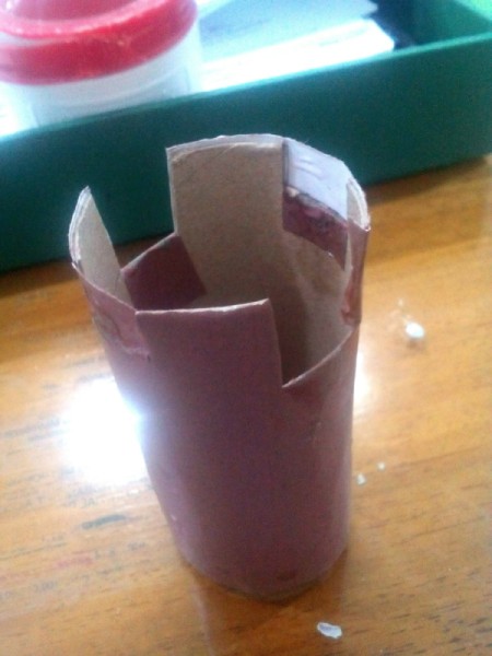 Table Top Mini Christmas Tree - notches cut and brown paper covers the tube