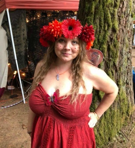 A red fairy costume with a flower crown and wings.