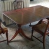 Value of a Dining Table and Chairs - table with two 3 legged pedestals and decorative back chairs
