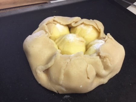 closed dough around apples