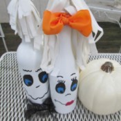 My Mr.& Mrs. Ghost Couple - couple on a patio table with a white pumpkin