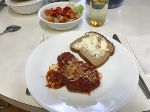 Eggplant Custard Bake with bread on dinner plate