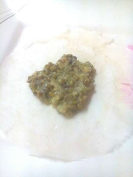 adding beans to wrapper