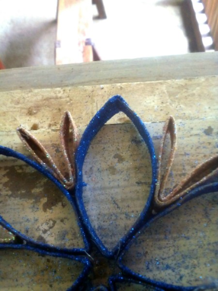 Paper Roll Ornament - insert and glue the folded ones in-between the flower petals