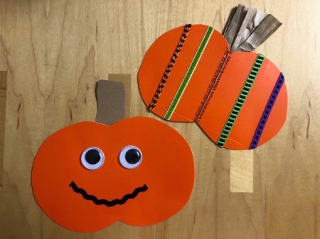 Decorated Paper Pumpkins - mouth added to pumpkin with eyes