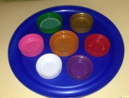 Repurpose Old Food and Storage Lids for Paint Palettes  - different sized colored lids can be used