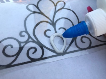 Plastic Bottle Tiara - trace the tiara with white glue