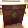Value of an Old Dresser - old dresser with ornate floral medallion on center of two drawers