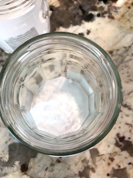 Party Hat Volcano Experiment for Kids - add baking soda and salt to a jar smaller than the hat