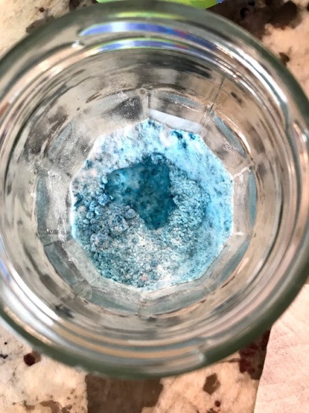 Party Hat Volcano Experiment for Kids - add dish soap to blue soap