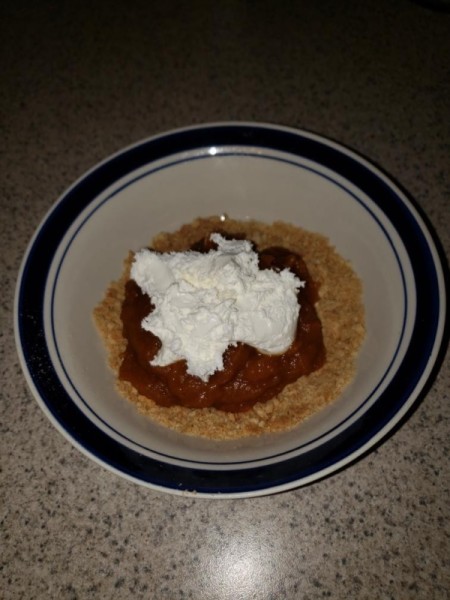 whipped topping on pumpkin filling