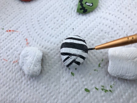 Decorative Halloween Stones - painting the mummy