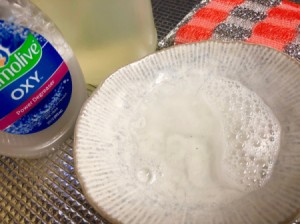 Add Vinegar to Dish Soap - bowl of suds and bottles of vinegar and dish soap