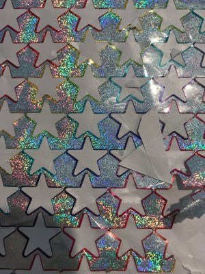 Teach Kids to Use Sticker Sheet Scraps - sticker sheet after star stickers used up