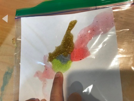 Glitter Art in a Ziploc Bag - slide the paper into the bag