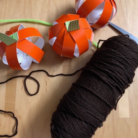 Pumpkin Garland - finished pumpkins and skein of yarn