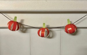 Pumpkin Garland - three paper pumpkins on yarn