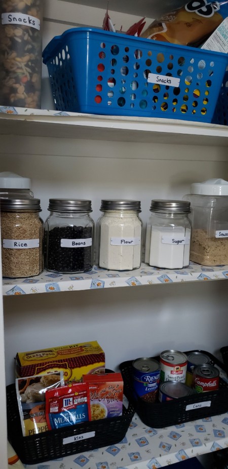 An organized pantry shelf.