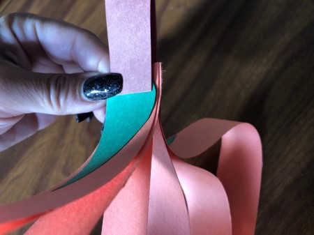 Hanging Paper Pumpkins - pinch the leaf on the top and then repeat with the stem