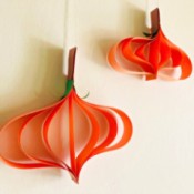 Hanging Paper Pumpkins - two hanging paper pumpkins