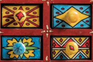 Brightly painted small drawers.