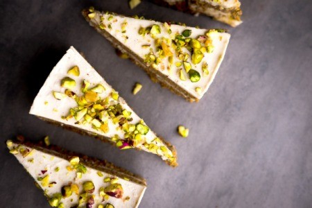 Pistachio Cake on a grey surface.