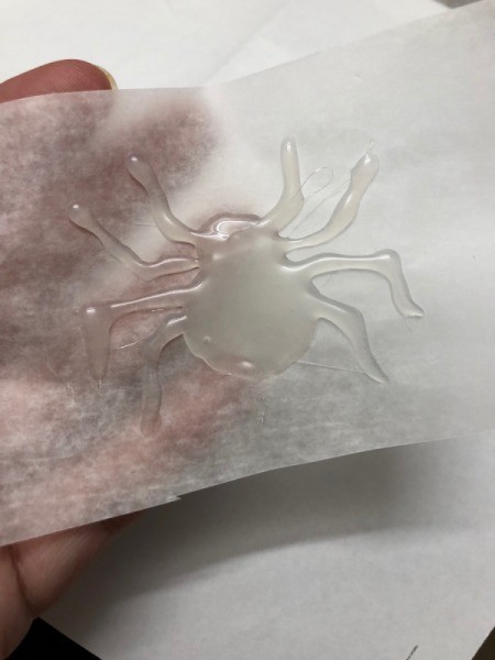 How to Make Hot Glue Spiders -cut out the spiders