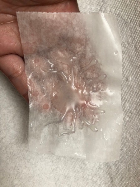 How to Make Hot Glue Spiders - peel spider off of the wet paper