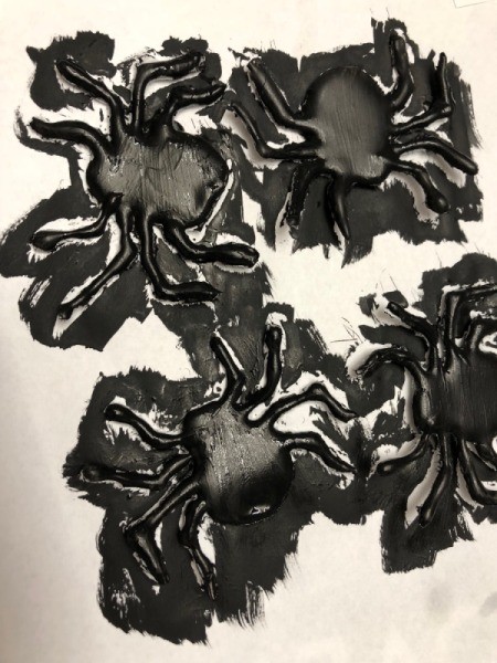 How to Make Hot Glue Spiders - four painted spiders