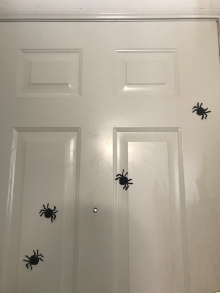 How to Make Hot Glue Spiders - spiders on door