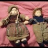 Identifying Porcelain Dolls - dolls lying on a comforter