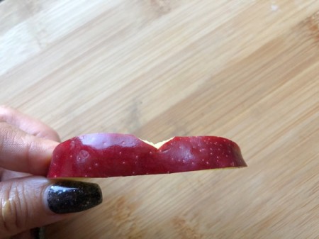 Apple slice with small triangle cut out