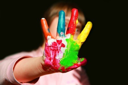 Close up of a child's hand painted.