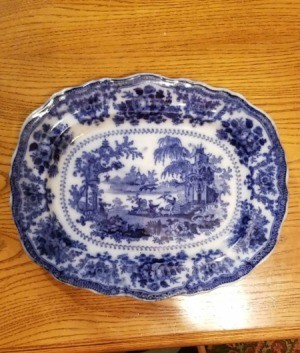 Value of an Antique Flow Blue Plate - platter