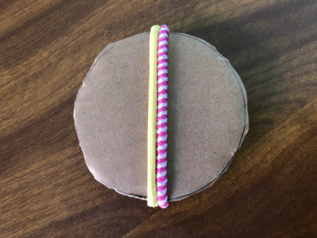 Hair Tie Lollipop Gift - begin wrapping the hair ties onto the cardboard