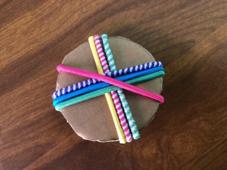 Hair Tie Lollipop Gift - make a cross, add on the diagonal and so on